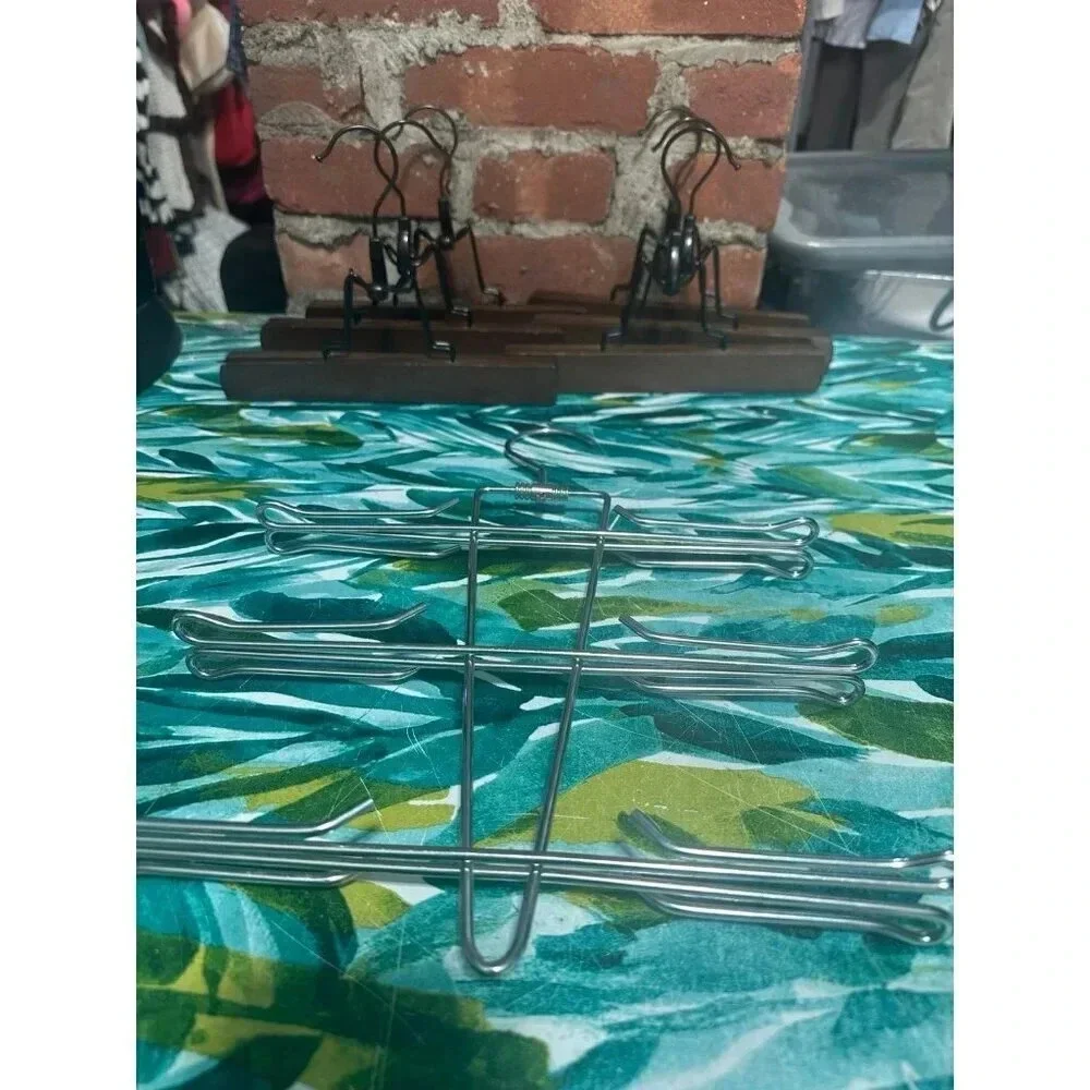 6 Wooden, 1 Metal Clothing Hangers